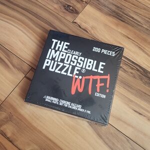 The Clearly Impossible Puzzle WTF Edition 200 Pieces Sealed Solid Black Puzzle